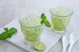 Es Timun Serut, a typical Indonesian drink made from shaved cucumber with syrup, lime and basil seeds. Popular during ramadan. photo