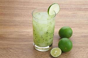 Es Timun Serut, a typical Indonesian drink made from shaved cucumber with syrup, lime and basil seeds. Popular during ramadan. photo