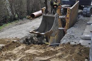 trench digging in building site photo