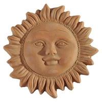 Ancient terracotta clay mask of the sun