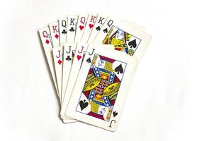 jugando a las cartas con el rey, la reina y el bromista foto