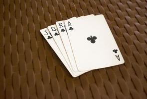 Playing cards of clubs. photo