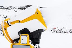 Snow cannon in operation in Sierra Nevada photo