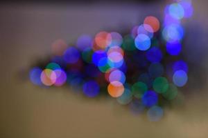 Glitter bokeh lights defocused background photo