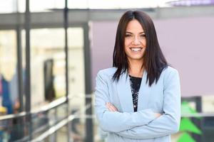 Businesswoman in modern office building photo