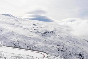 Ski resort of Sierra Nevada in winter, full of snow. photo