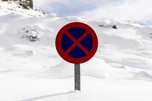 Snowed road sign no parking in Sierra Nevada photo