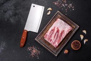 Close-up fat Salted lard homemade lard on a wooden board photo