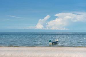 Beautiful tropical summer beach seascape with wooden boat, landscape of seaside
