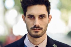 Close-up of attractive man in the street in formalwear. photo