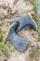 The shoes farmer wearing on the paddy rice photo