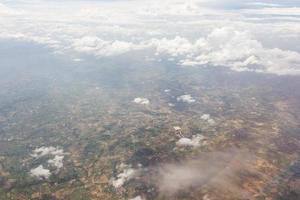 Blue sky with clouds on the airplane photo