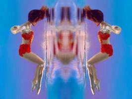 unbelievable, surreal, incredible, amazing underwater portrait of slim, fit woman in bright orange swimming suit photo