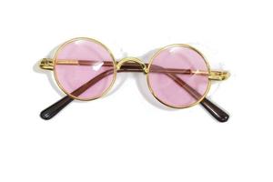 gafas de lujo rosa sobre un fondo blanco foto