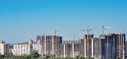 construction cranes in the Kyiv city, Ukraine
