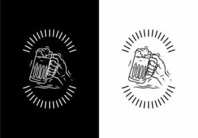 Black and white of hand holding beer badge