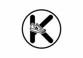 Black K initial letter with shoes in circle vector