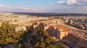 Aerial fly over historical Sanliurfa castle site in Urfa city. Famous travel destination in Turkey video