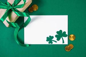 Greeting card for St. Patrick's Day on a green background. photo