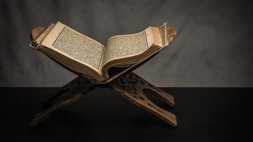 Koran holy book of Muslims  public item of all muslims  on the table , still life photo