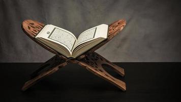 Koran holy book of Muslims  public item of all muslims  on the table , still life photo