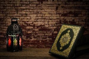 Koran holy book of Muslims  public item of all muslims  on the table , still life photo