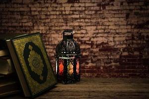 Koran - holy book of Muslims  public item of all muslims  on the table , still life photo