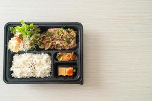 Japanese rice with pork yaki bento set photo