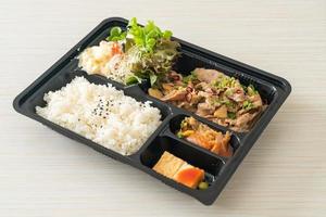 Japanese rice with pork yaki bento set photo