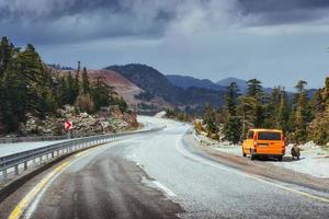 beautiful scenic highway in mountains. Car rides on asphalt surf photo