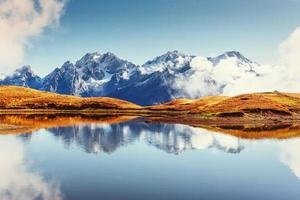 Sunset on mountain lake Koruldi. Upper Svaneti, Georgia, Europe photo