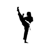 silhouette of taekwondo girl showing her high kick vector