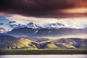 Gentle slopes of snow-capped mountains and glaciers. Wonderful I photo