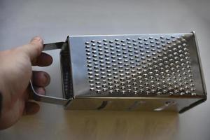 Stainless Steel Vegetable Grater Close-up photo