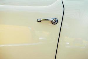 close up of the side parts on a sport vintage automobile photo