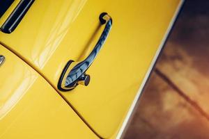 close up of the side parts on a sport vintage automobile photo