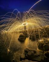 Steel wool photography above the rocks