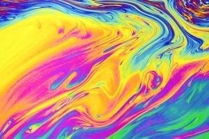 Rainbow colors. Psychedelic multi colored patterns background. Photo macro shot of soap bubbles