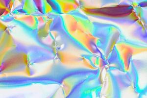 Holographic iridescent background. holographic foil texture background. photo