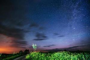 fantastic meteor shower and the snow-capped mountains photo