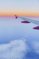 Wing aircraft and a view of cumulus clouds photo