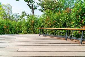 empty bench on balcony with tree background photo