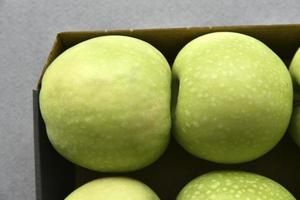 Green apples in the background close-up photo
