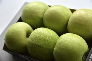 Green apples in the background close-up photo