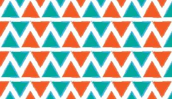 Seamless pattern. Triangle motif. Geometric pattern. Modern style motif design in orange and green colors. Can be used for posters, brochures, postcards, and other printing needs. Vector illustration