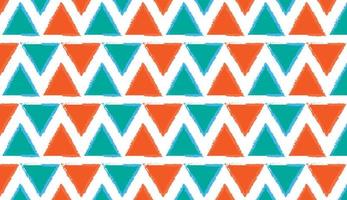 Seamless pattern. Triangle motif. Geometric pattern. Modern style motif design in orange and green colors. Can be used for posters, brochures, postcards, and other printing needs. Vector illustration