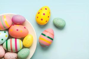 Happy Easter. Colored easter painted eggs in a bowl photo