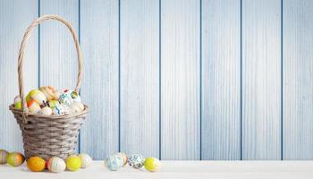 Easter background with colorful easter eggs on wooden background. photo