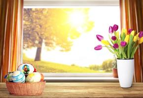 Beautiful Easter background with colorful tulips and easter eggs. photo