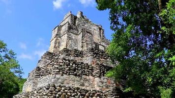Ancient Mayan site with temple ruins pyramids artifacts Muyil Mexico. video